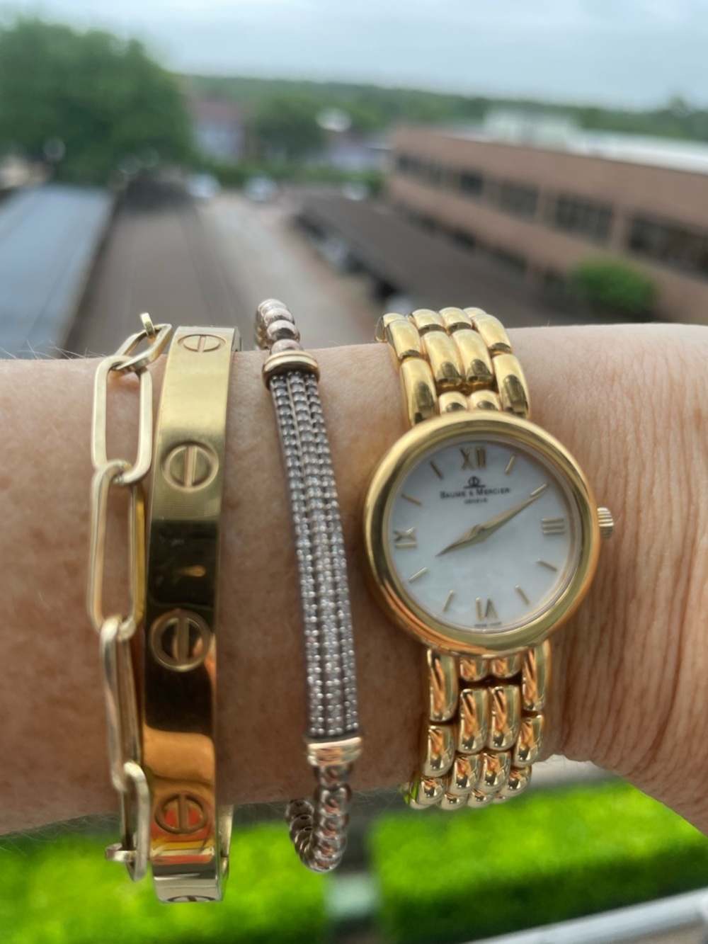 Baume & Mercier 14kt Women's Gold Bracelet Watch - Mother of Pearl Dial